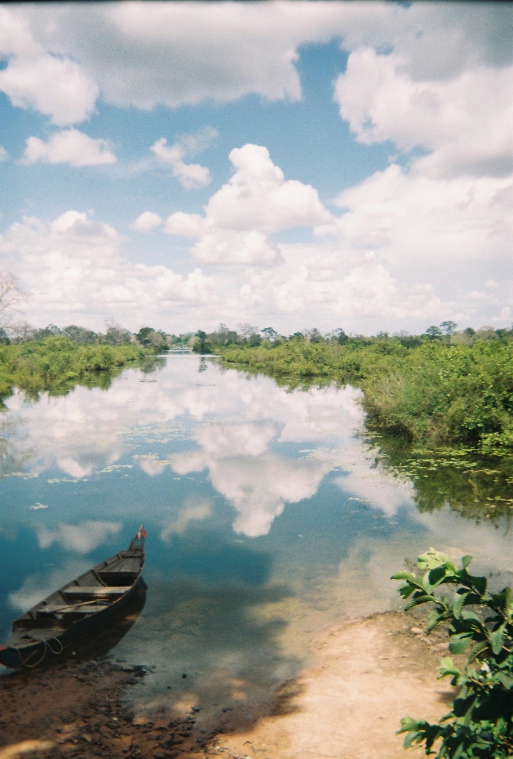 {Cambodia} Boat Behind
